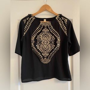 Stunning Eve Gravel top with gold embellishments